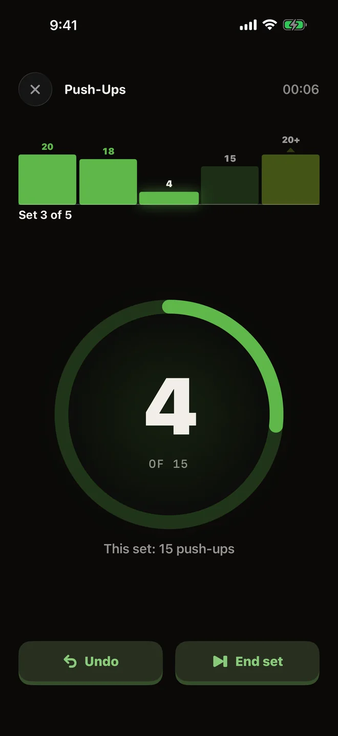 Push-Ups: rep 4 of 15 in the third set.